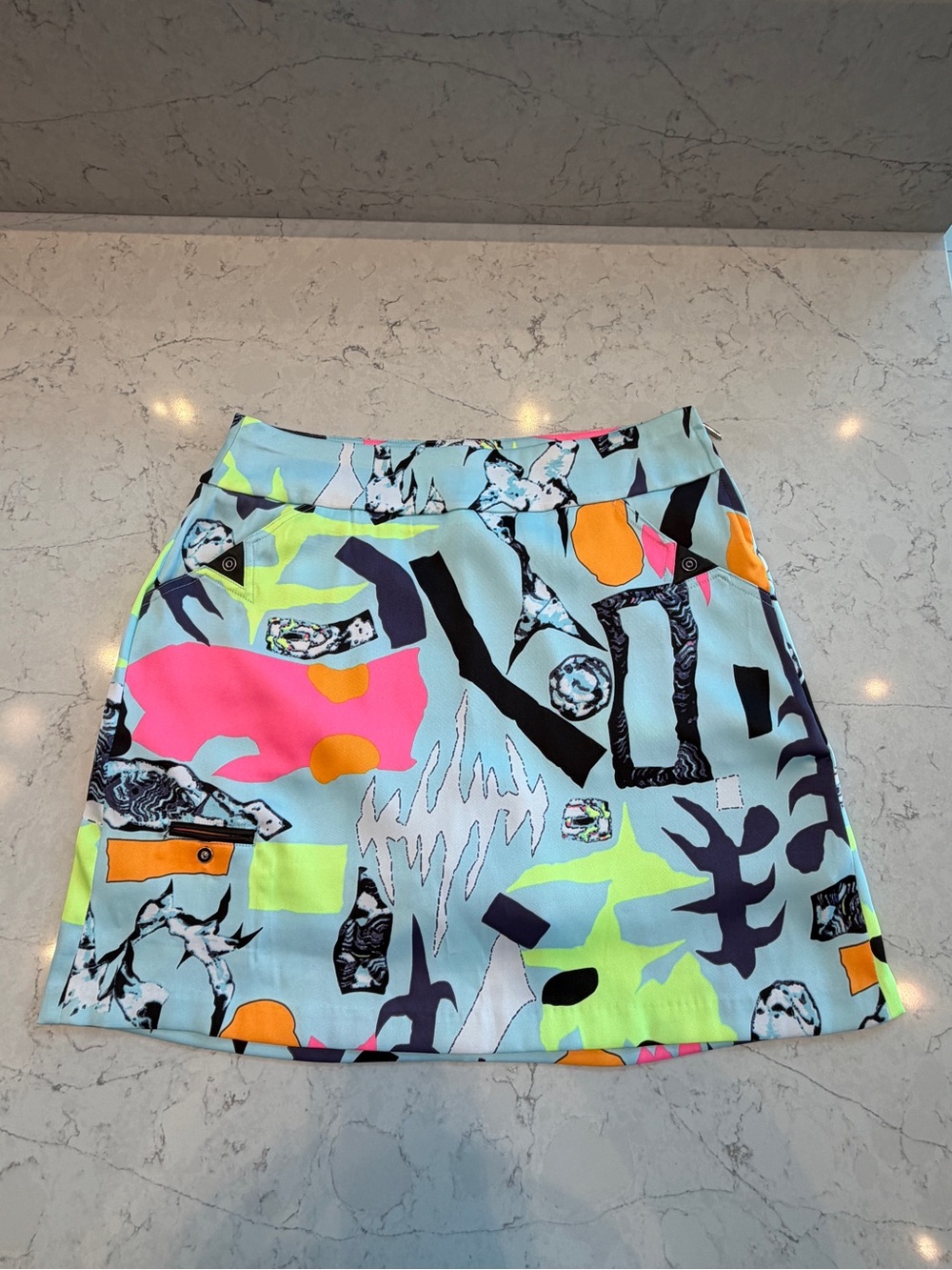 jamie sadock Neon Abstract Print Golf Skort in Aqua, Pink, Yellow, & Orange